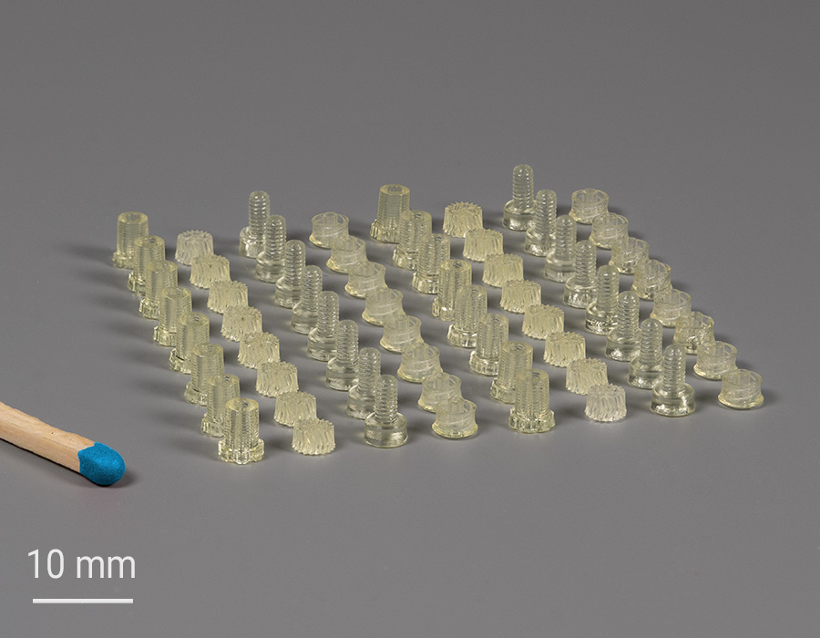 Millimeter-sized mechanical high-precision parts by 2PP macroscale 3D-printing