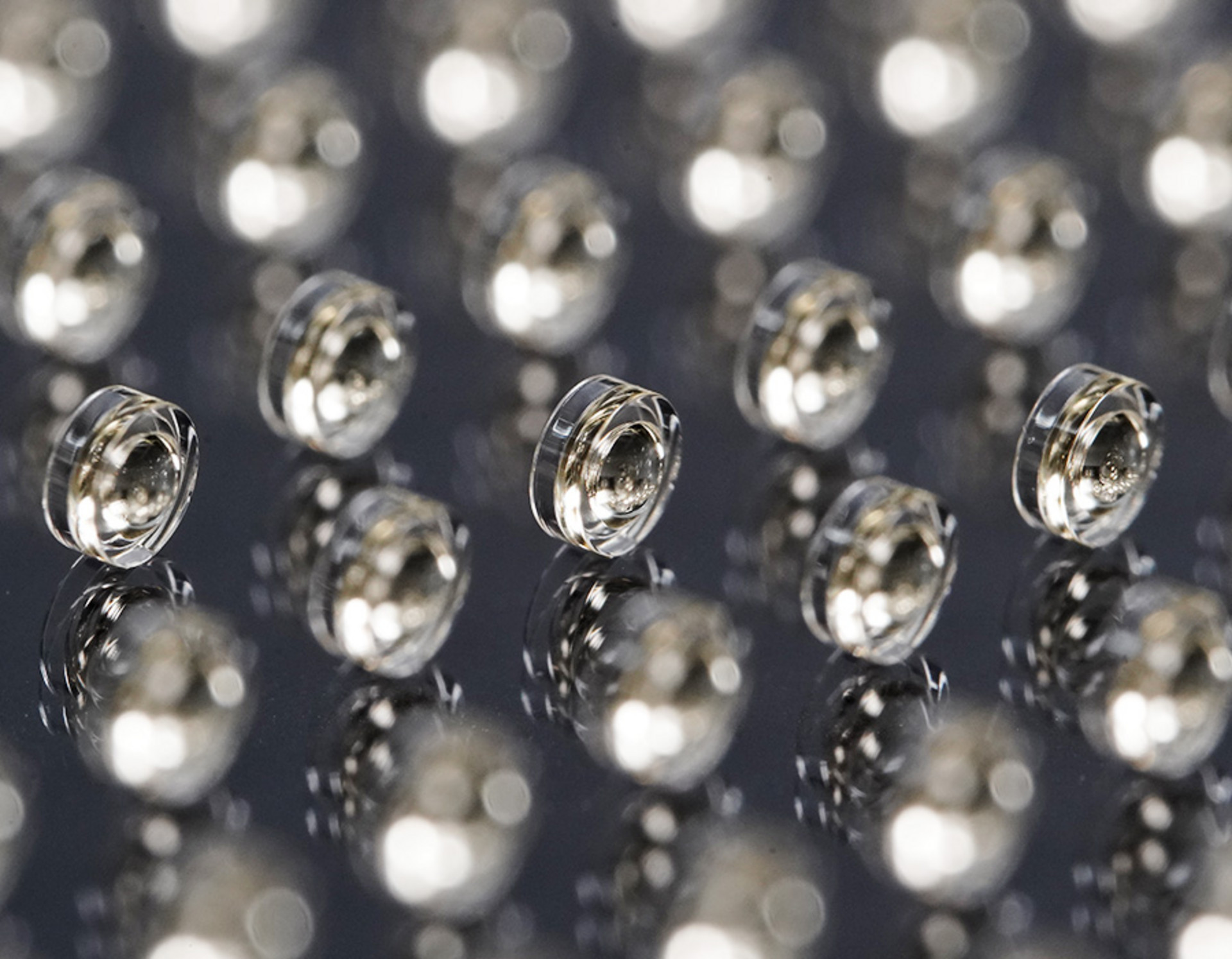 Double sided aspherical lenses