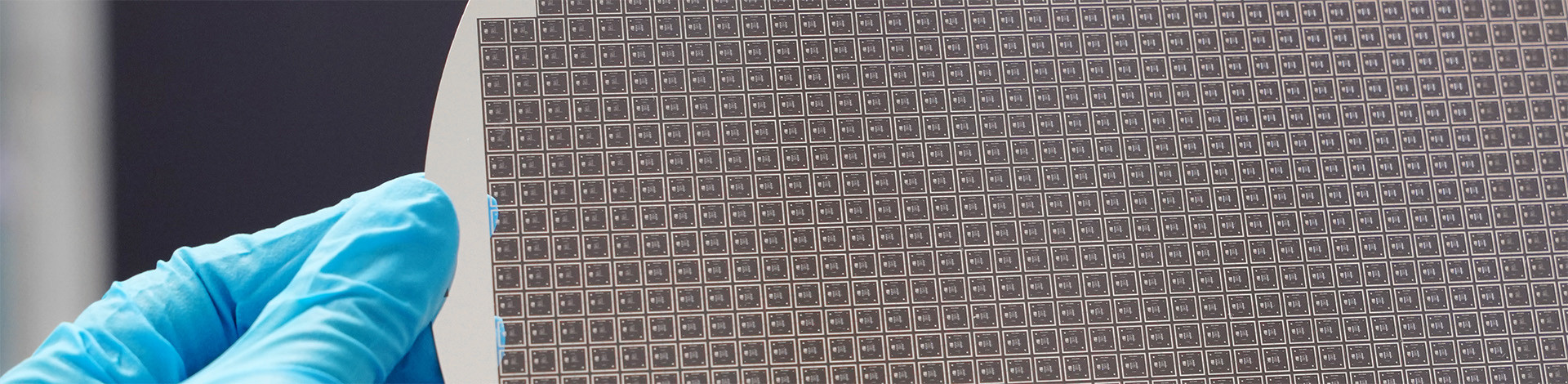 An 8-inch wafer hold by a person