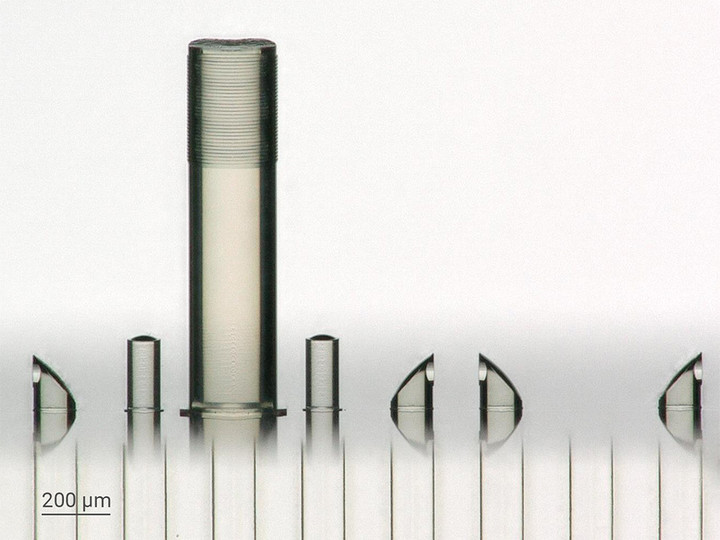 3D printed freeform micro-optics precisely printed onto a fiber array