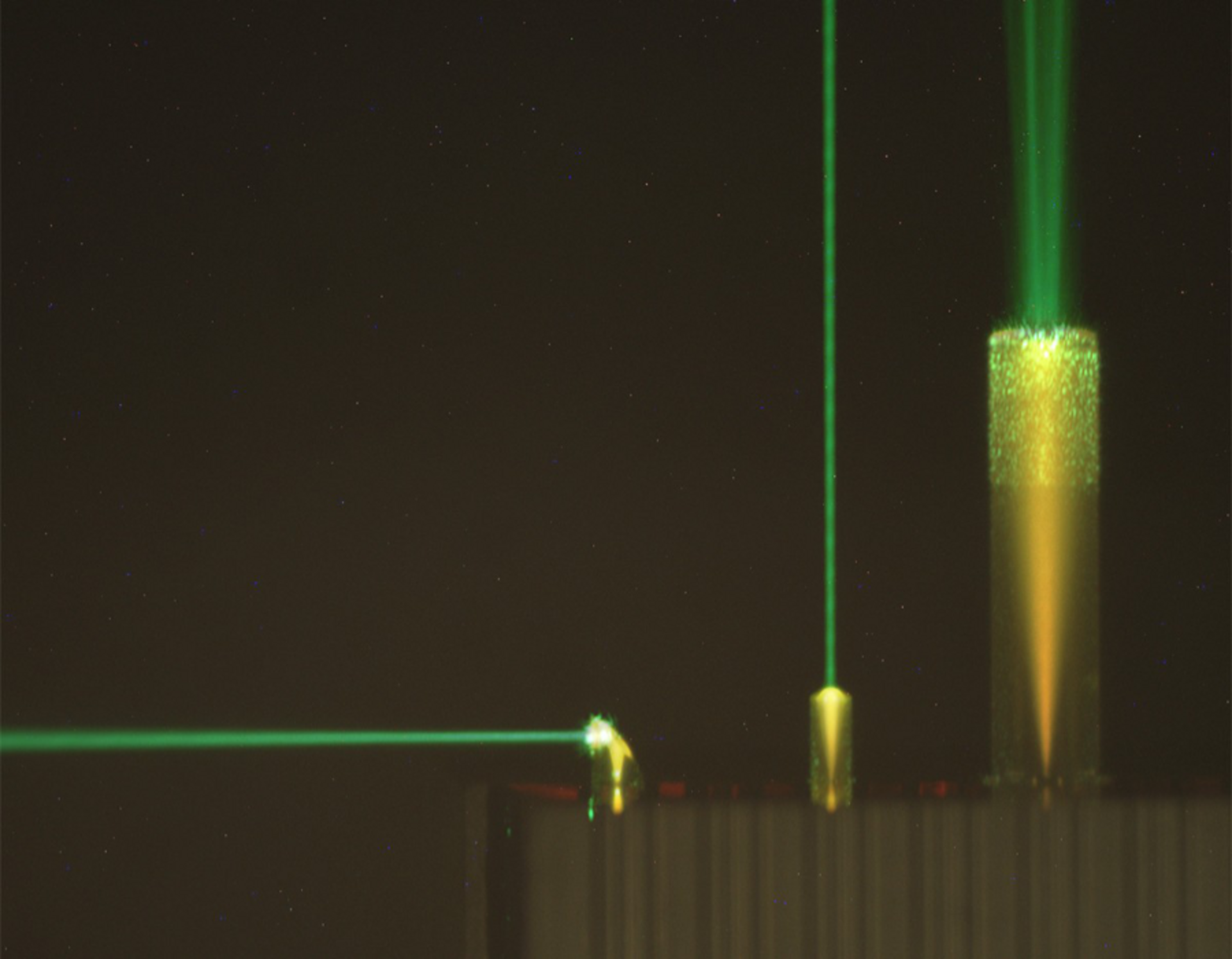 Microscope image of 3D-printed beam-shaping micro-optics on an optical fiber array. 