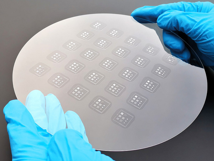 Microlens arrays replicated on fully populated 8” wafer by nanoimprint lithography (NIL)