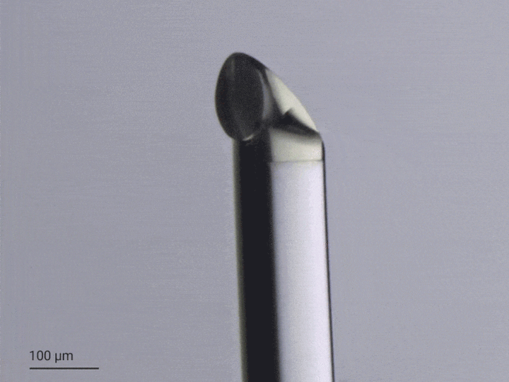 3D-printed freeform total internal reflection mirror on the tip of a no-core fiber
