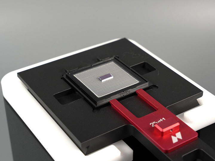 The substrate holder for chip-aligned printing is easy to use and features a gelpak© to easily secure one or multiple chips for badge processing