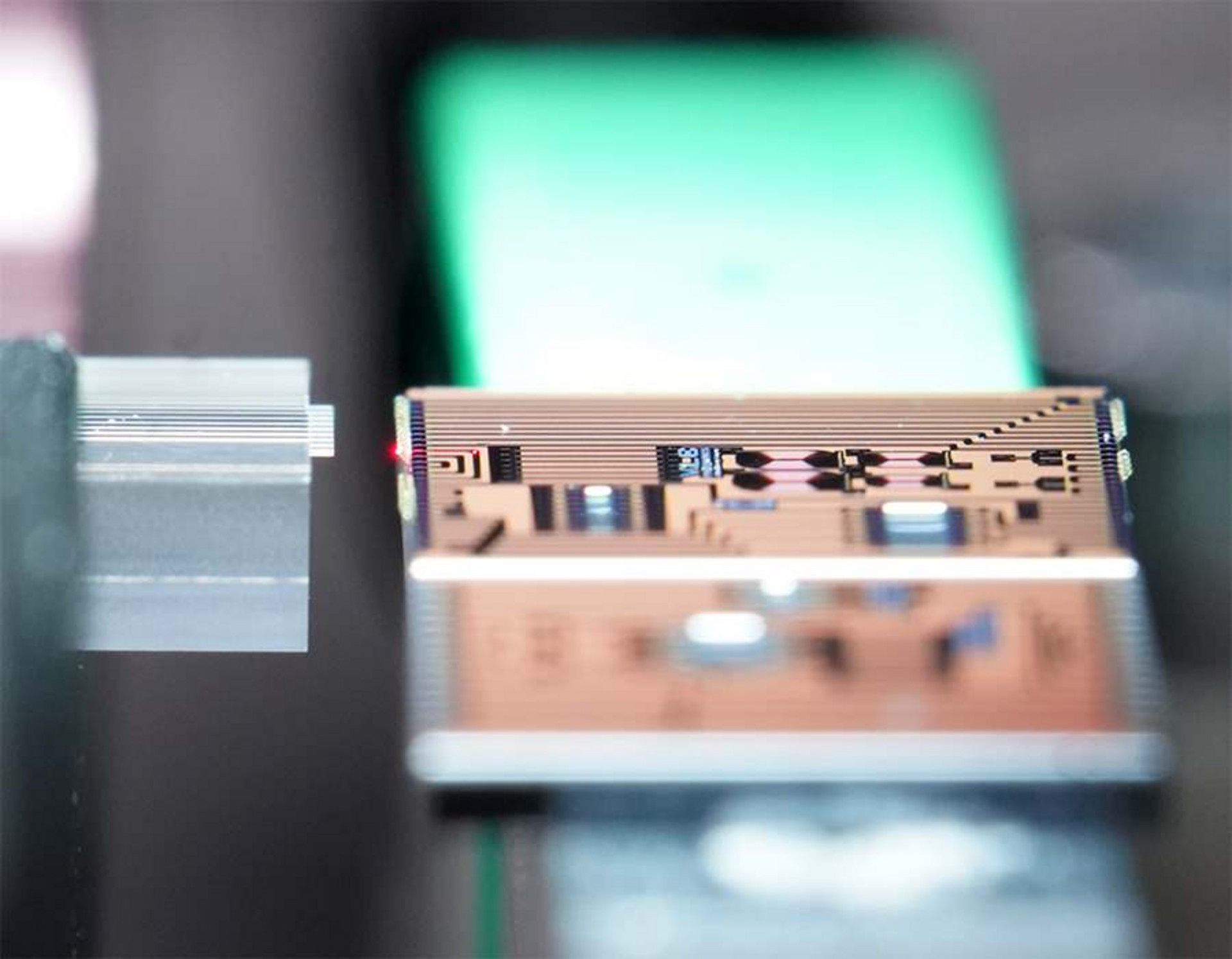 3D-printed precision collimating lenses connecting light signals to an opposing photonic chip