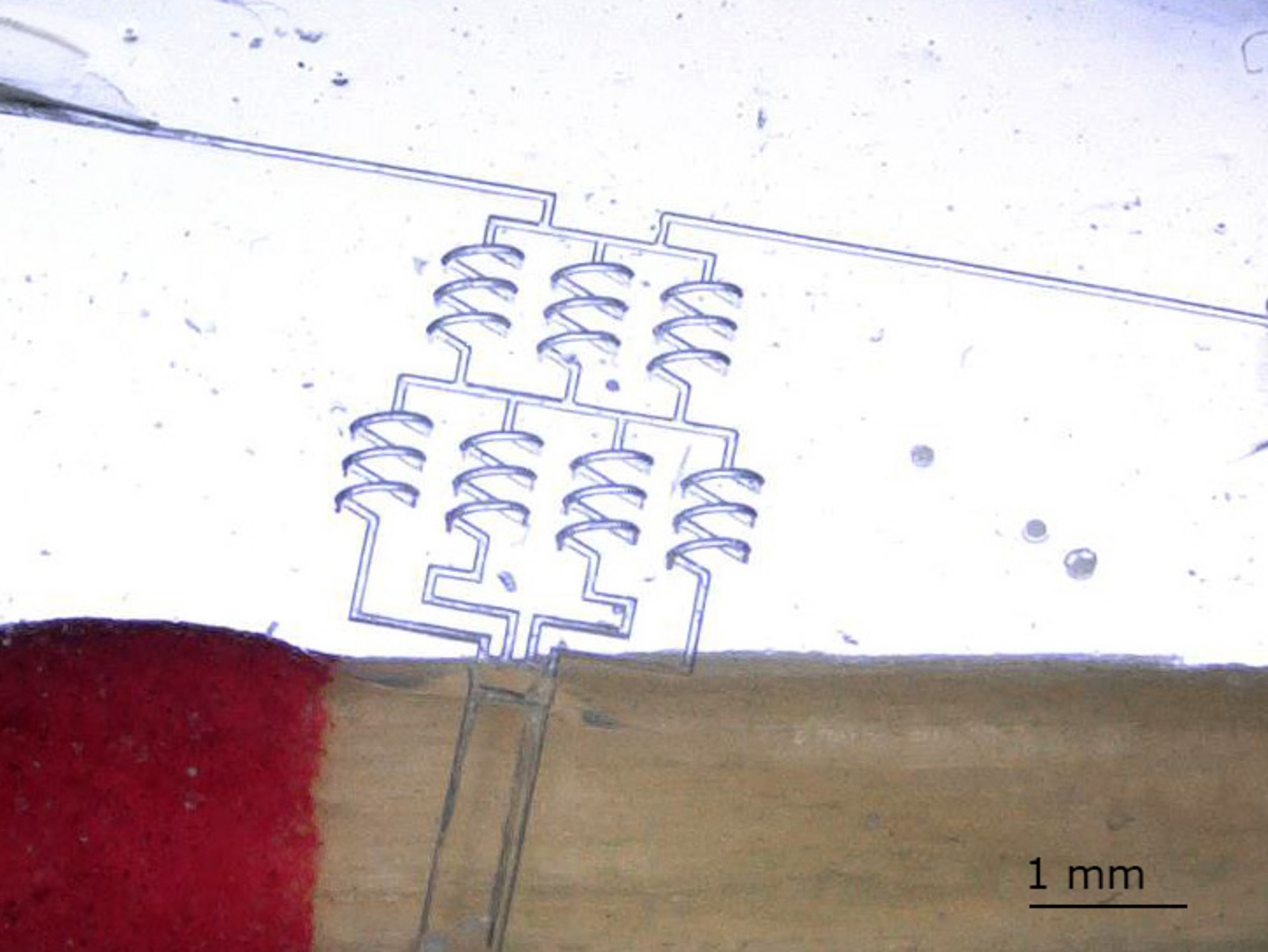 3D microfluidic mixer in fused silica glass fabricated based on Nanoscribe's microfabrication technology