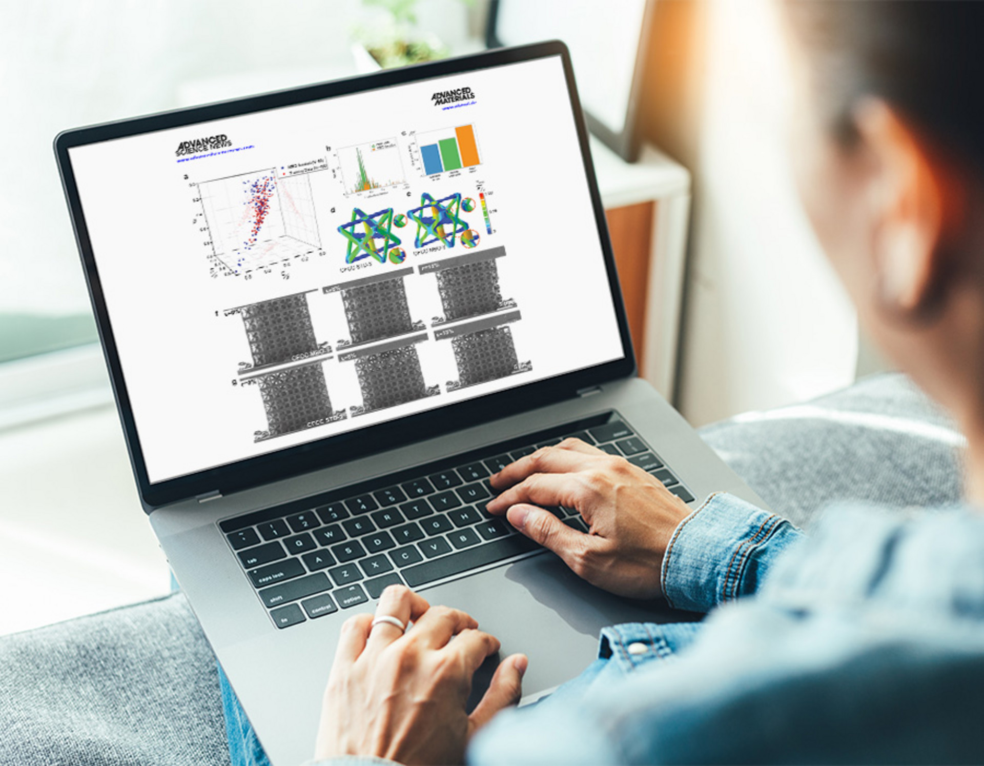Person reading the scientific publication on a Laptop