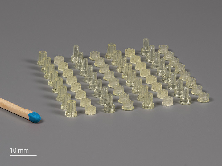 Set of micromechanical parts printed with Quantum X shape, the XLF Print Set and IPX-M