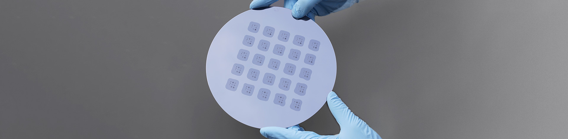 Fully populated 8” master fabricated by step and repeat nanoimprint lithography (NIL) from a 2GL-printed single die master.